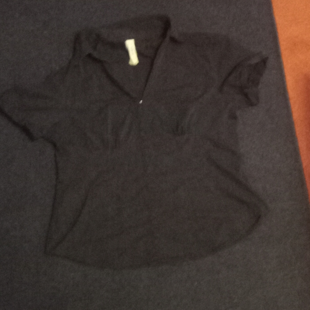 Black shirt, with grommets in the back.